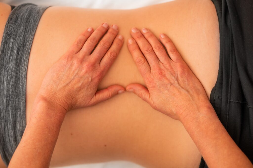 Manual therapy performed on back of patient.